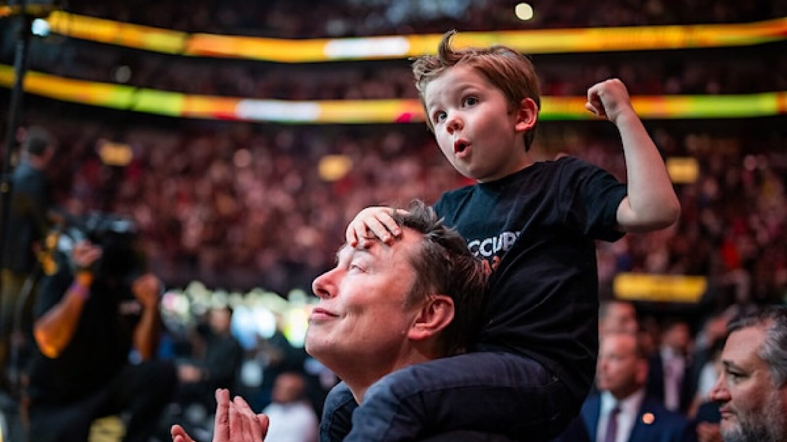 Elon Musk and his son, little X, attend UFC 314 in Miami, Florida, on Saturday night, April 12, 2025 (Official White House photo)