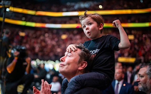 Elon Musk and his son, little X, attend UFC 314 in Miami, Florida, on Saturday night, April 12, 2025 (Official White House photo)