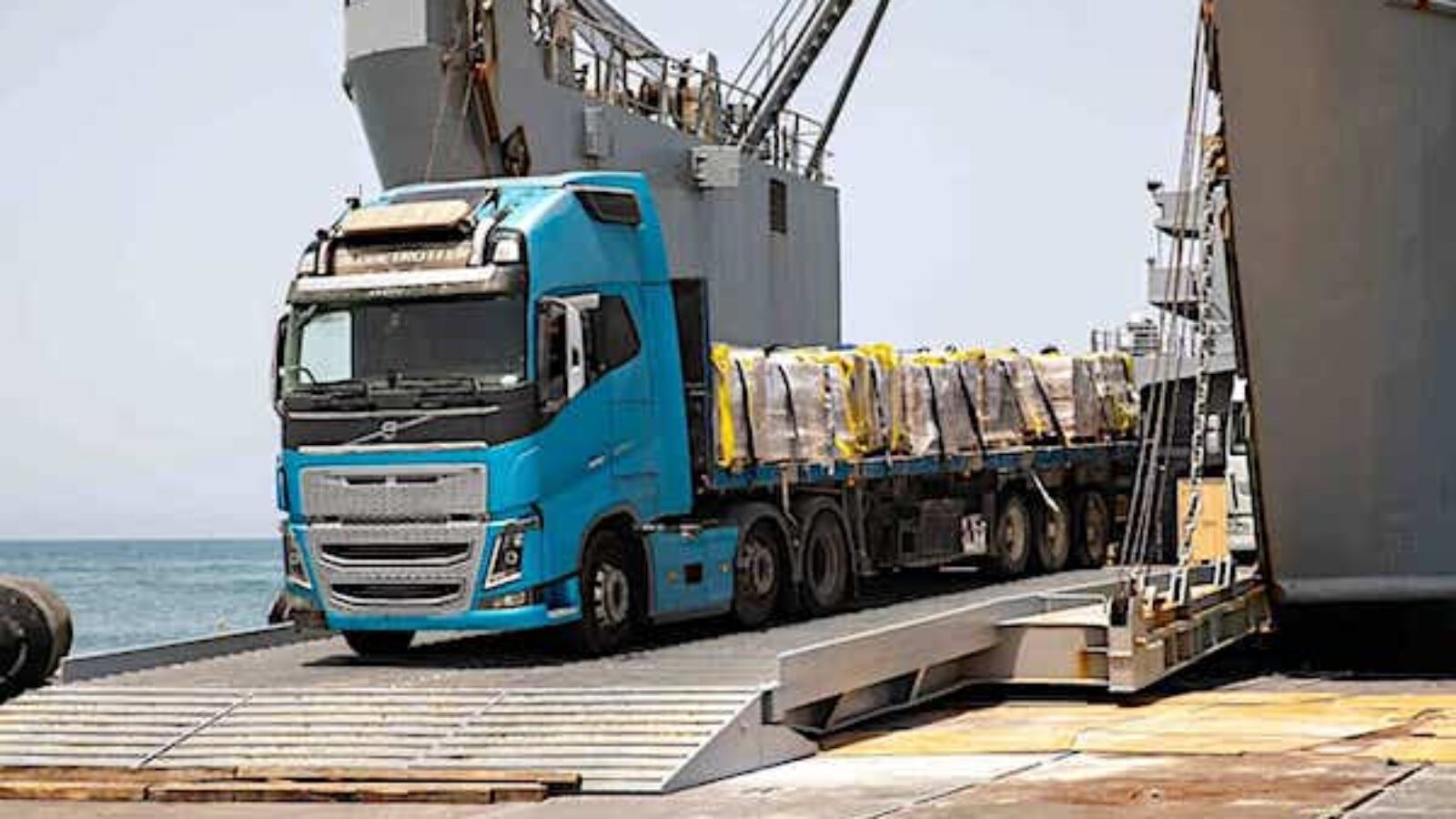 An aid truck rolls off the U.S.-built floating pier on its journey to a U.N. warehouse in Gaza. (CENTCOM photo)
