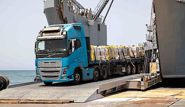 An aid truck rolls off the U.S.-built floating pier on its journey to a U.N. warehouse in Gaza. (CENTCOM photo)