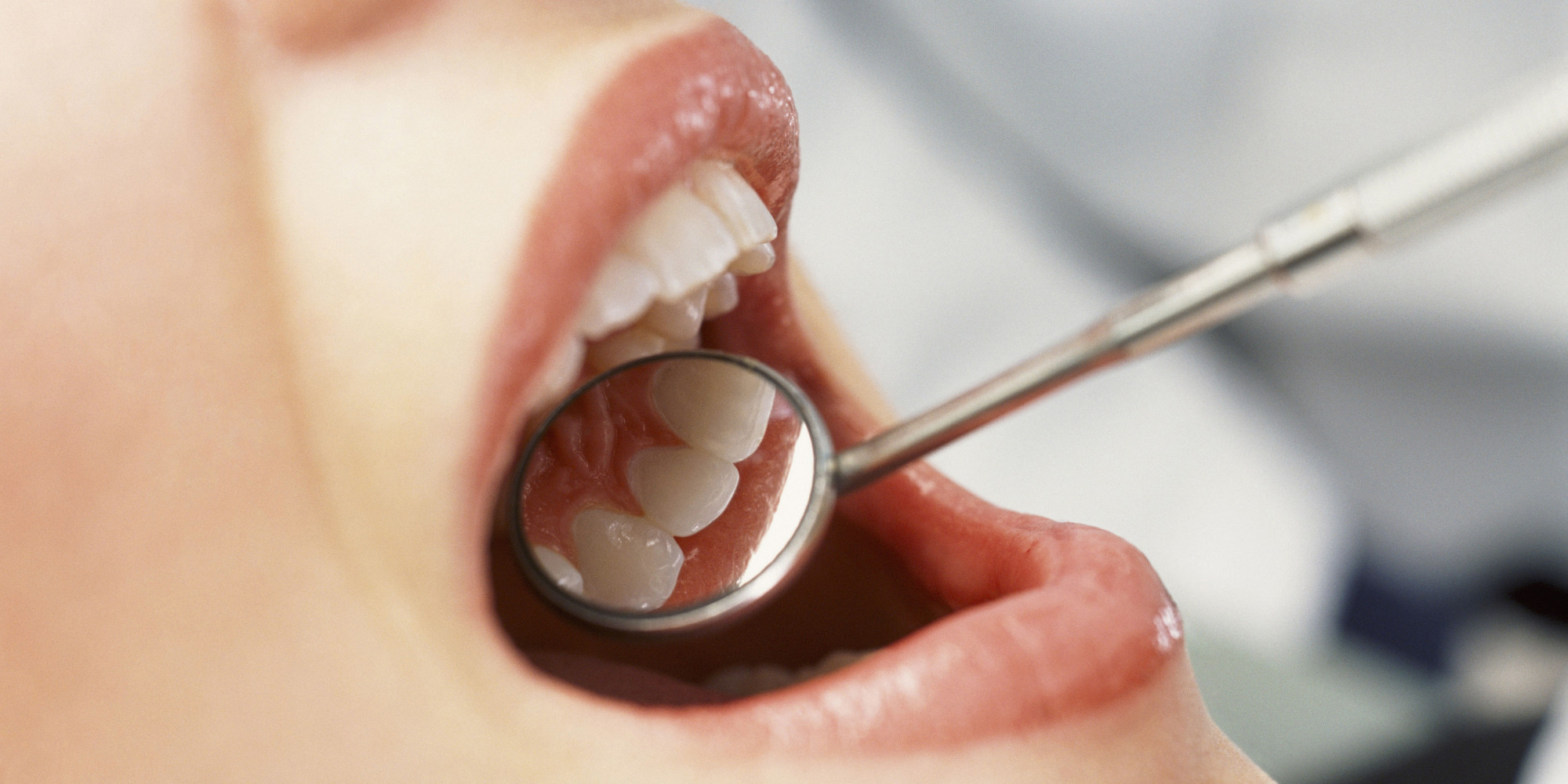 woman doing dental care